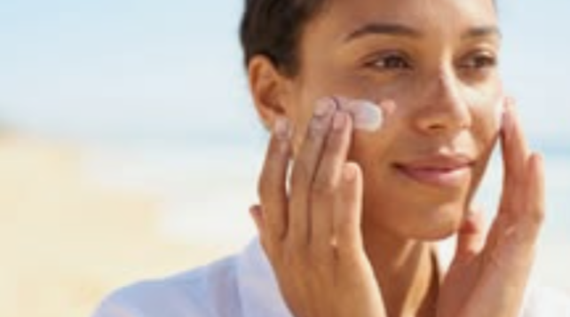 Simple Skincare Routine for Busy Women 4 Applying sunscreen as the final morning step of a simple skincare routine